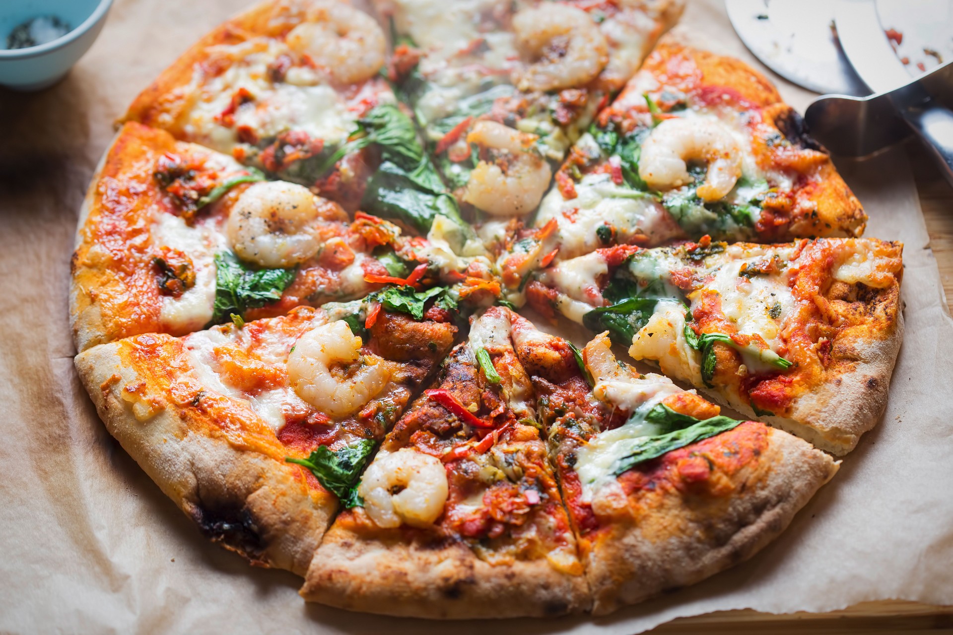 Garlic king prawn wood fired pizza with spinach & red chilli